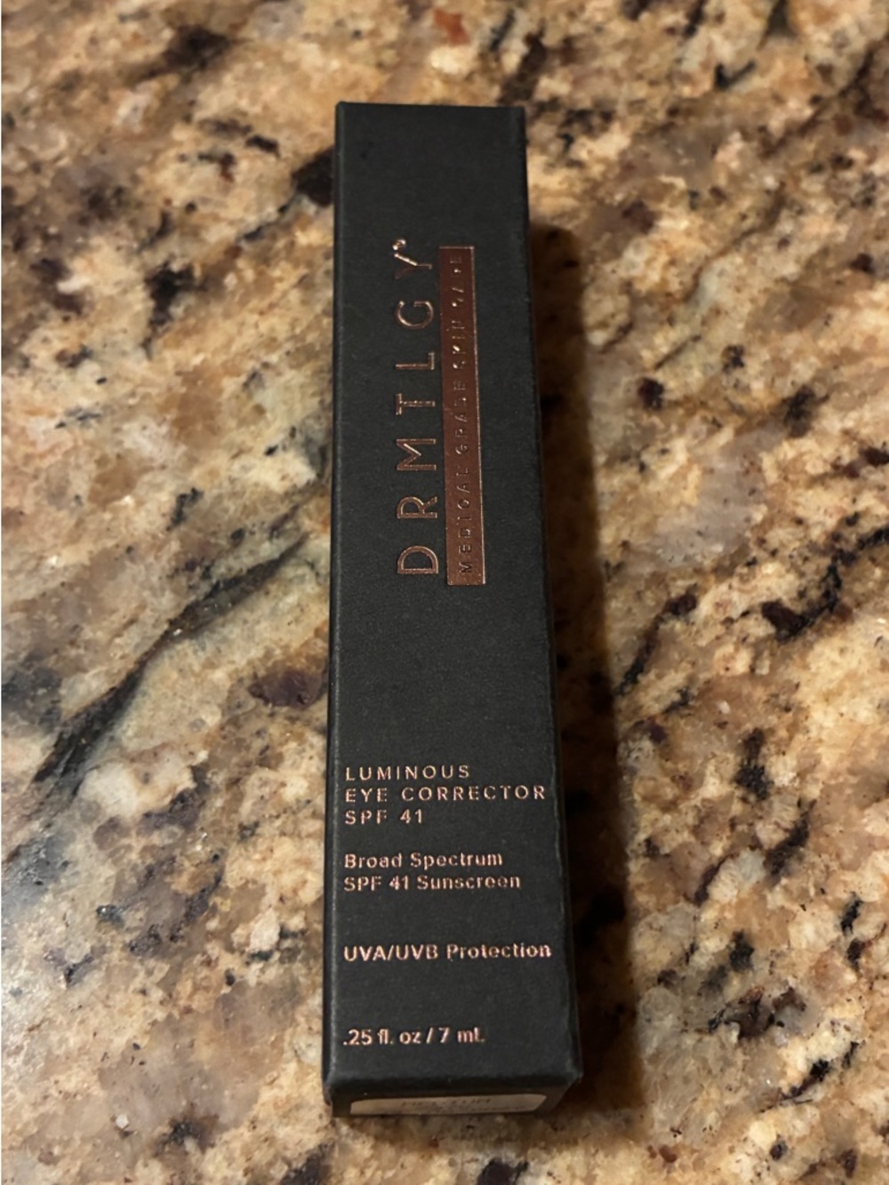 DRMTLGY Luminous Eye Corrector - Black & Rose Gold Packaging